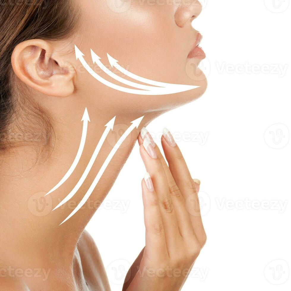 Pretty woman touching her neck, isolated on white background. Anti-aging concept photo