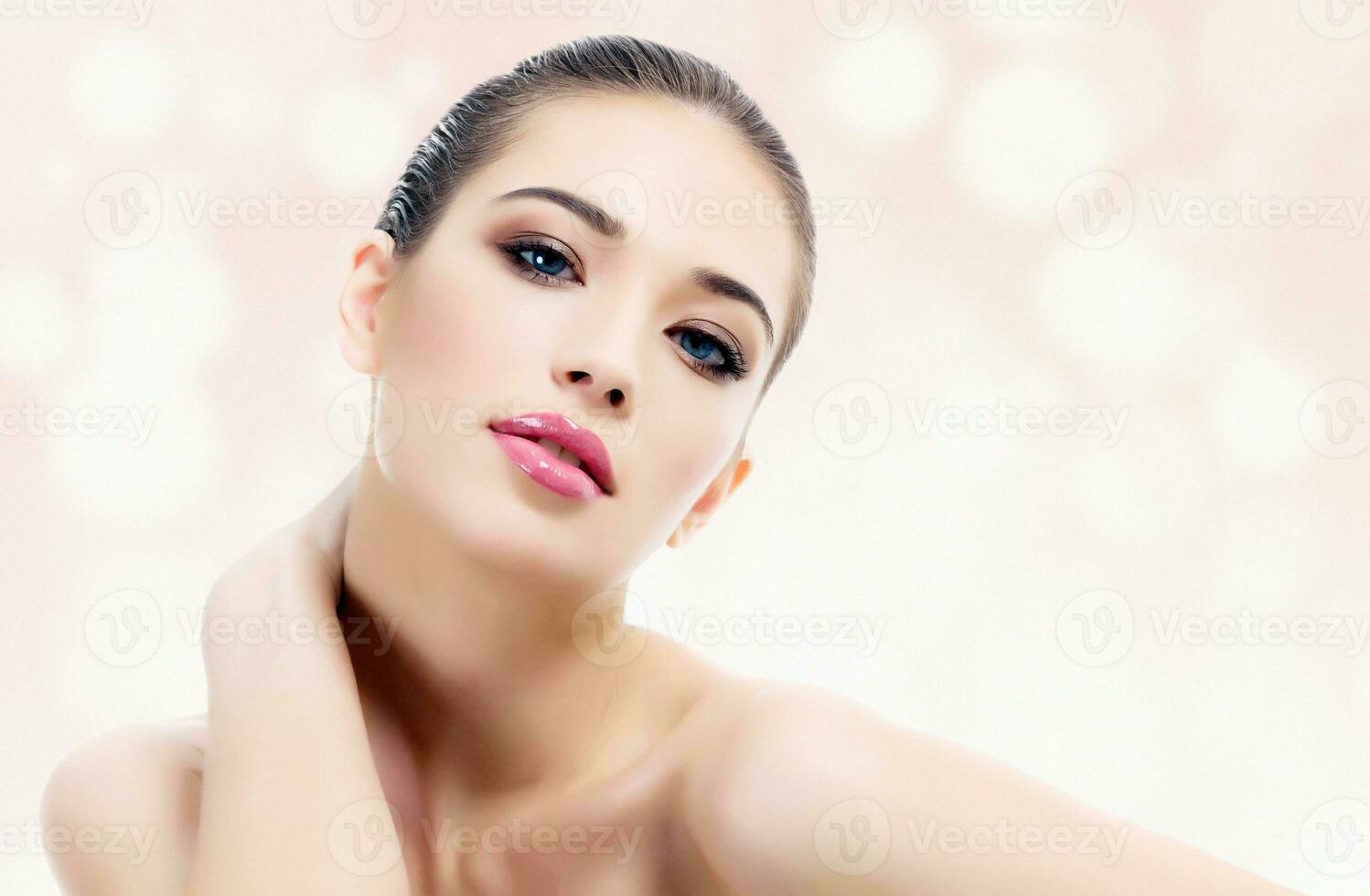 Pretty woman against an abstract background photo
