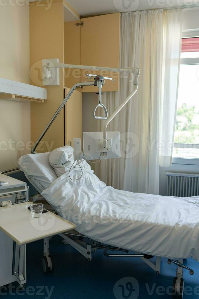 A hospital bed. Medical equipment in the ward. photo