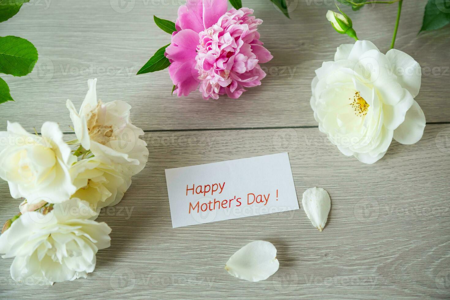 bouquet of summer white roses and peonies on wooden table photo