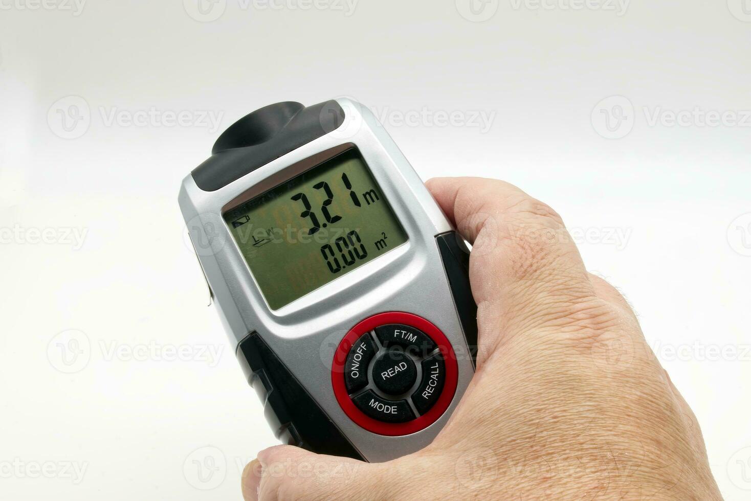 Ultrasonic distance meter isolated on white background. photo