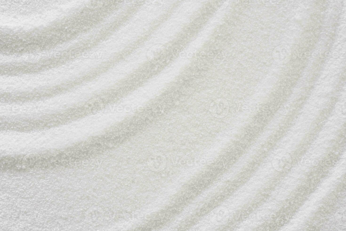 Zen Garden with concentric circless on white sand texture background,Japanese Zen Garden with lines texture, Zen like concept,Top view Sand surface with copy space for Spa, Cosmetic background photo