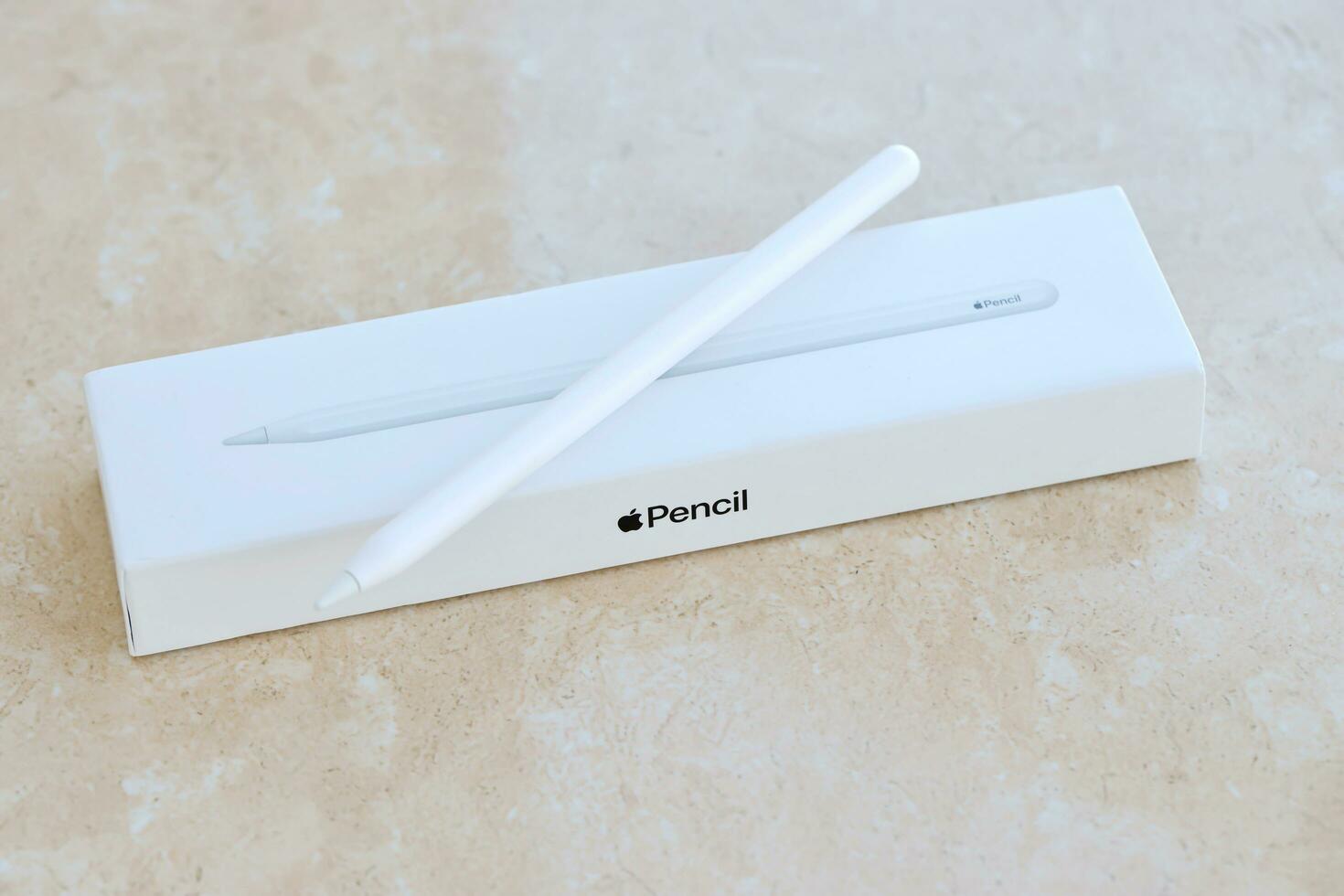 KYIV, UKRAINE - 4 MAY, 2023 New Apple pencil generation 2. Features a flat edge that attaches magnetically for automatic charging and pairing photo