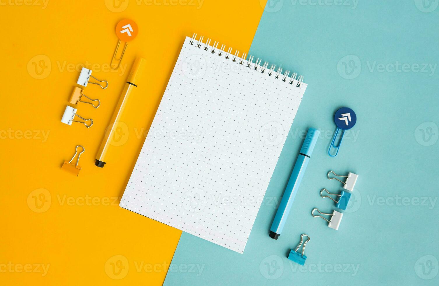 School supplies. Yellow and blue colors. Empty notebook. Flat lay composition. Space for text. photo