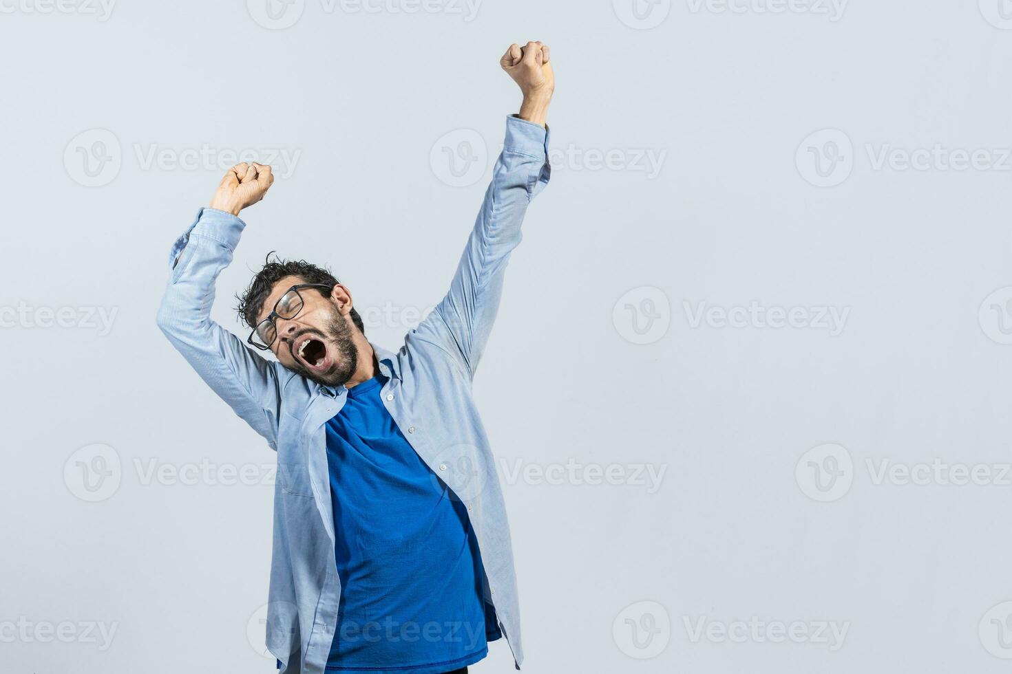 Beard man yawning and stretching his hands, sleepy man stretching his hands isolated, concept of a sleepy exhausted man photo