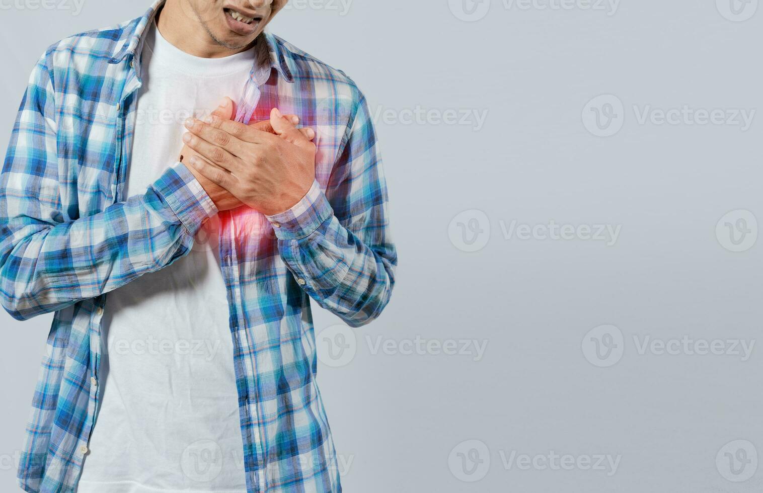 People with chest pain isolated, young man with tachycardia, man with heart pain on isolated background, young man with heart pain. Concept of people with heart problems photo