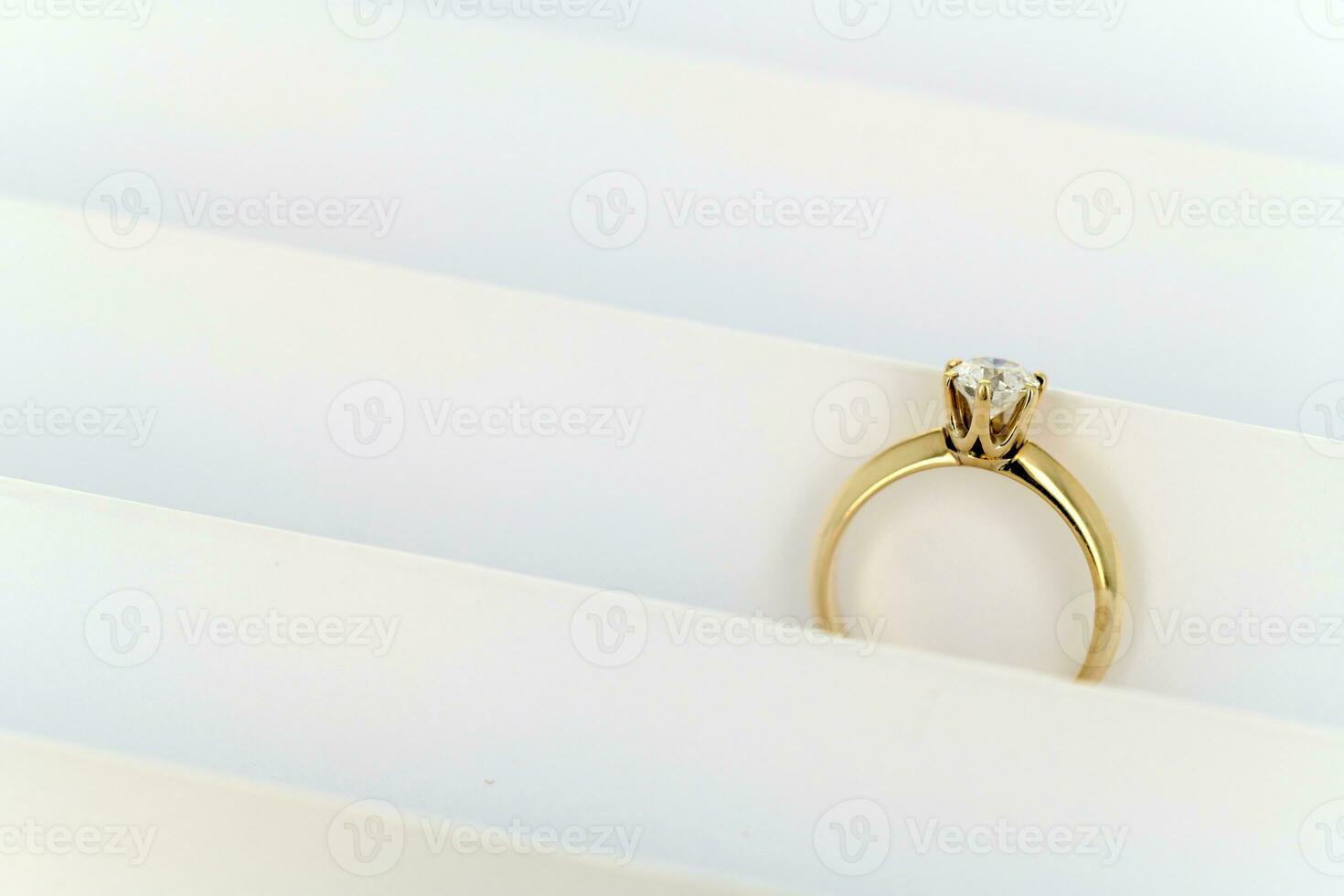 Diamond ring on white background photo