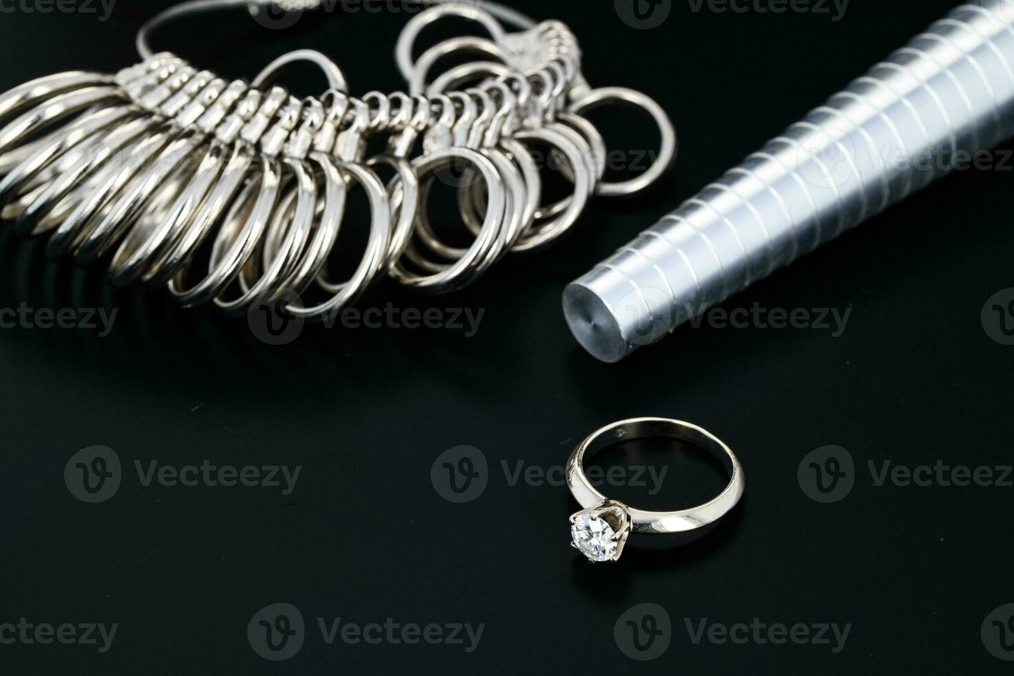 Diamonds and jeweler tools photo