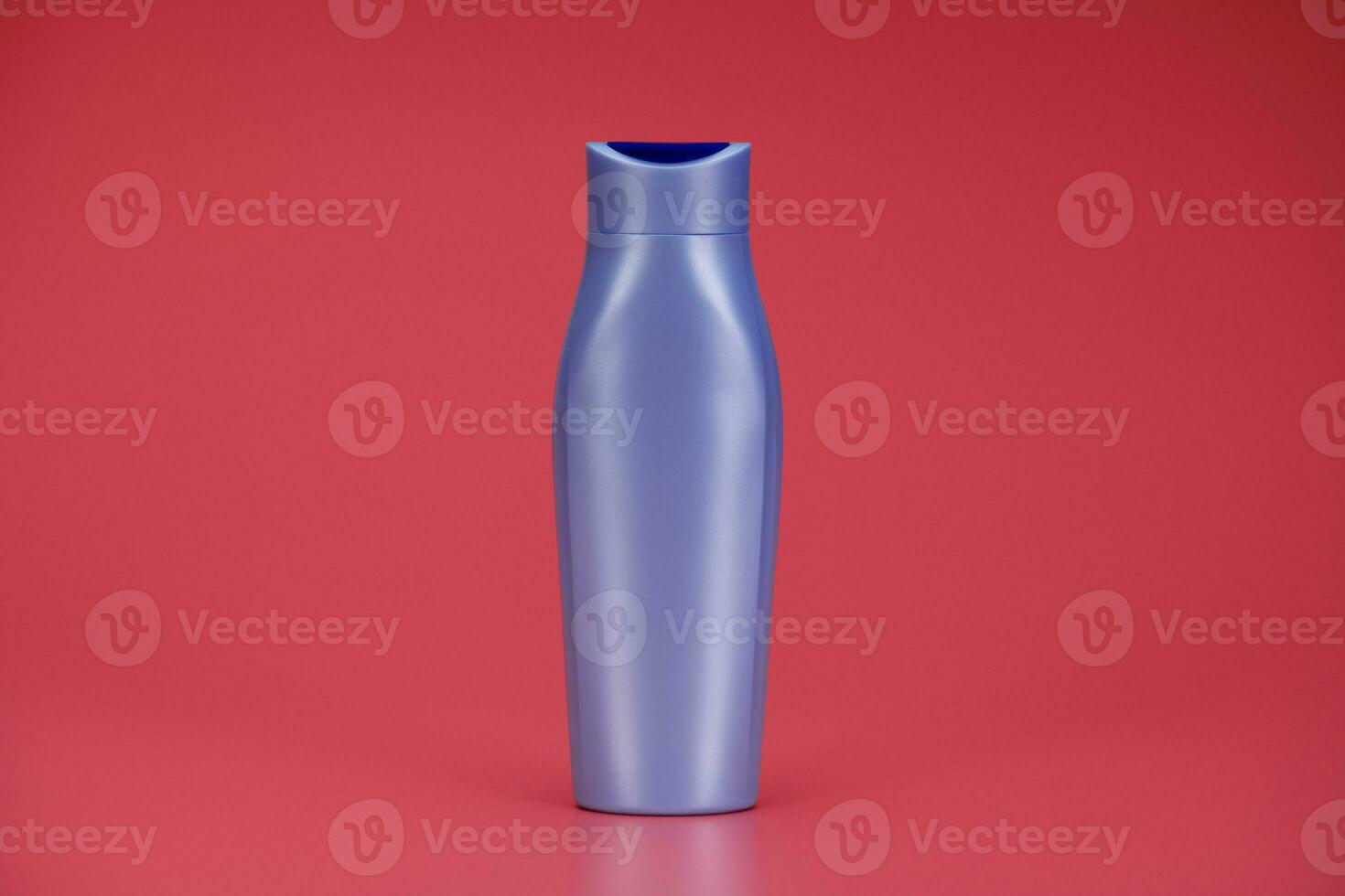 Blank Label Shampoo Bottle or Shower Gel on Pink Background photo