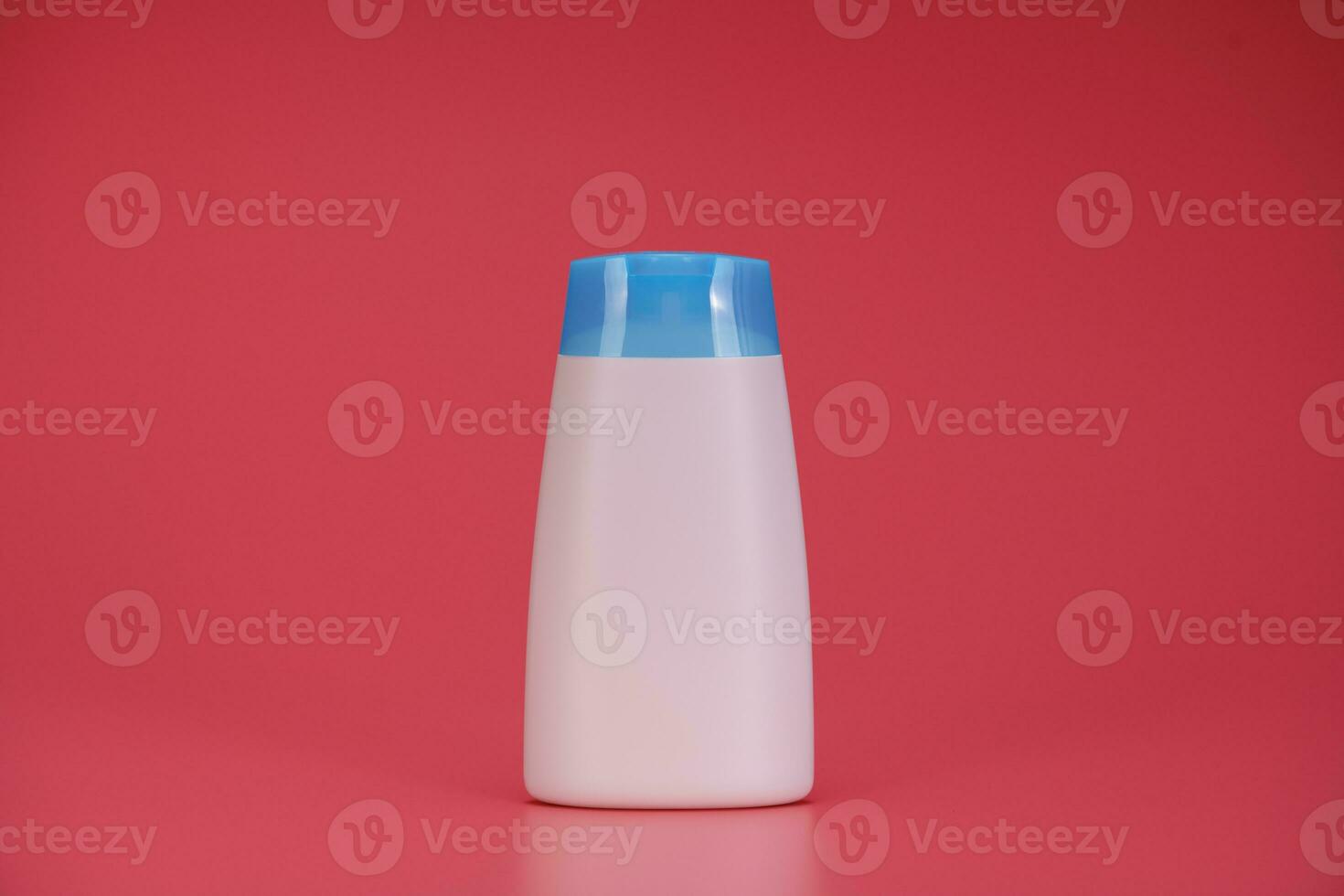 Blank Label Shampoo Bottle or Shower Gel on Pink Background photo