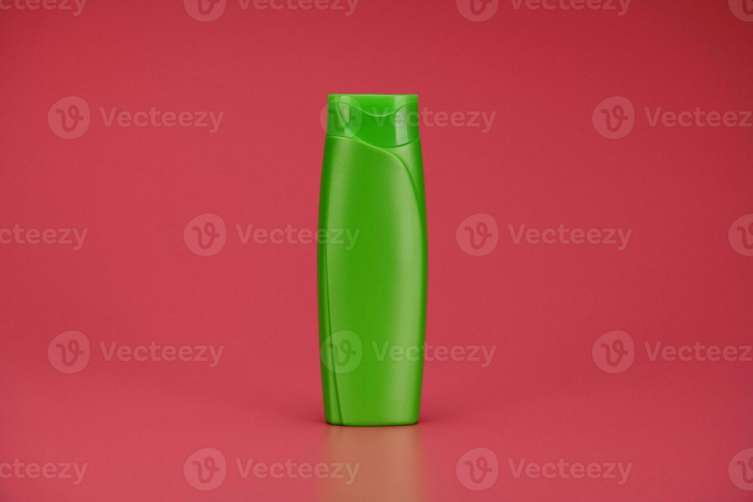 Blank Label Shampoo Bottle or Shower Gel on Pink Background photo