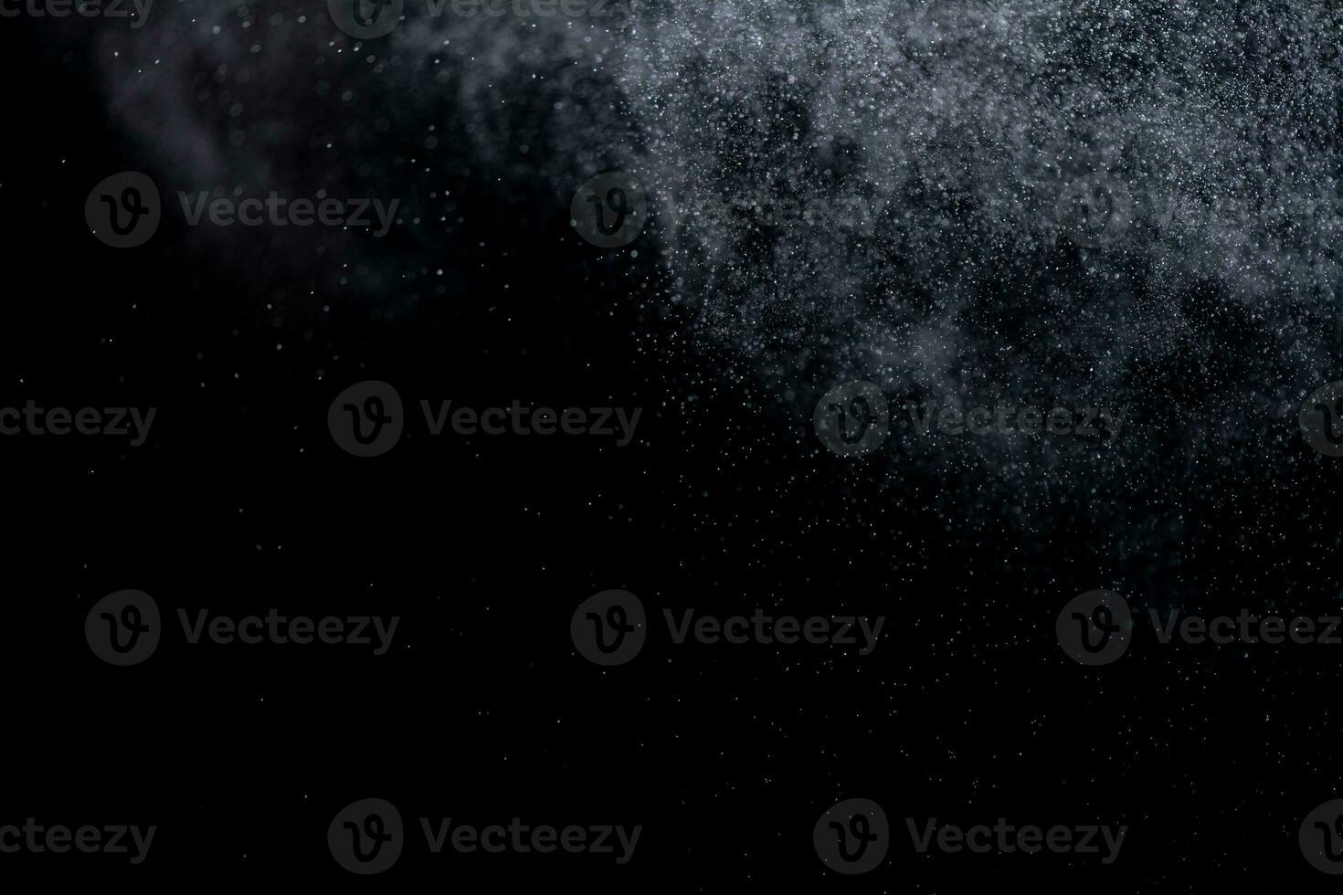 small drops of rain, snow on a black background. wind. Natural background photo