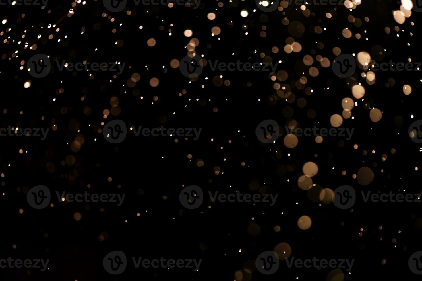 small drops of rain, snow on a black background. wind. Natural background photo