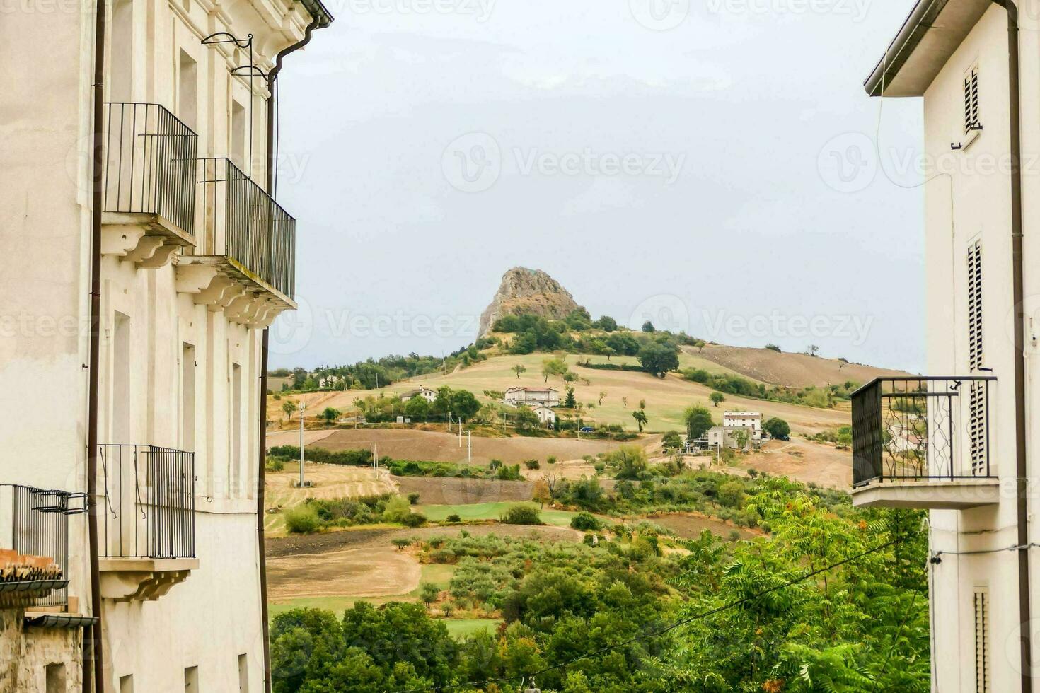 a view of the hills from an old town photo