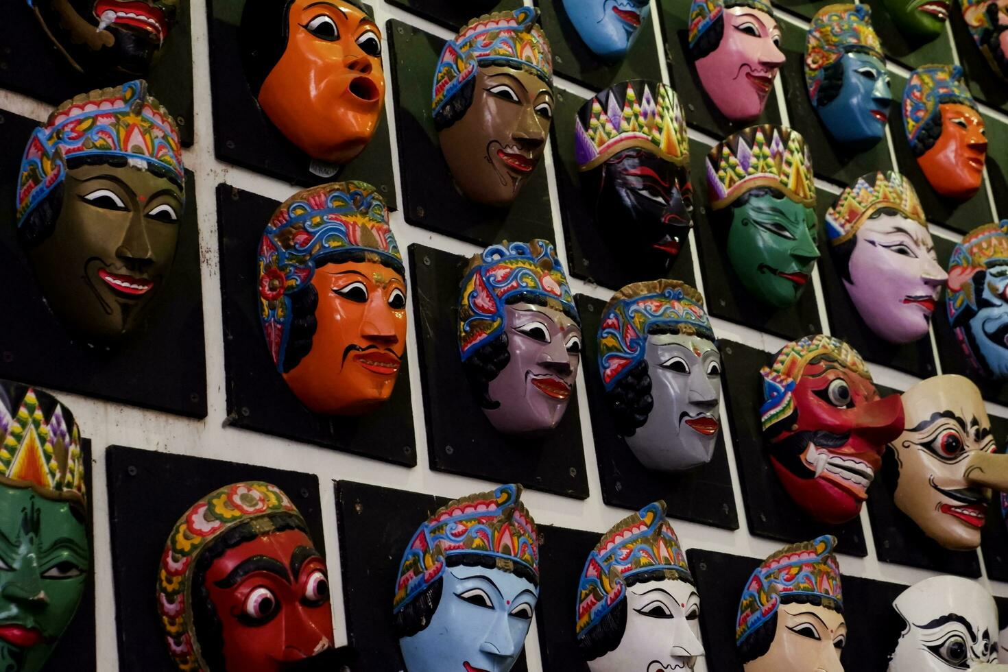 Batu - Indonesia, October 08, 2023. Various types of forms of Malangan Masks originating from Malang district. photo