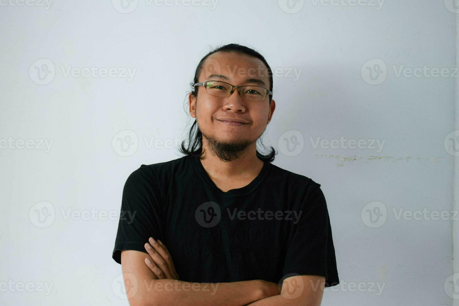 Adult Asian man wearing black t-shirt photo