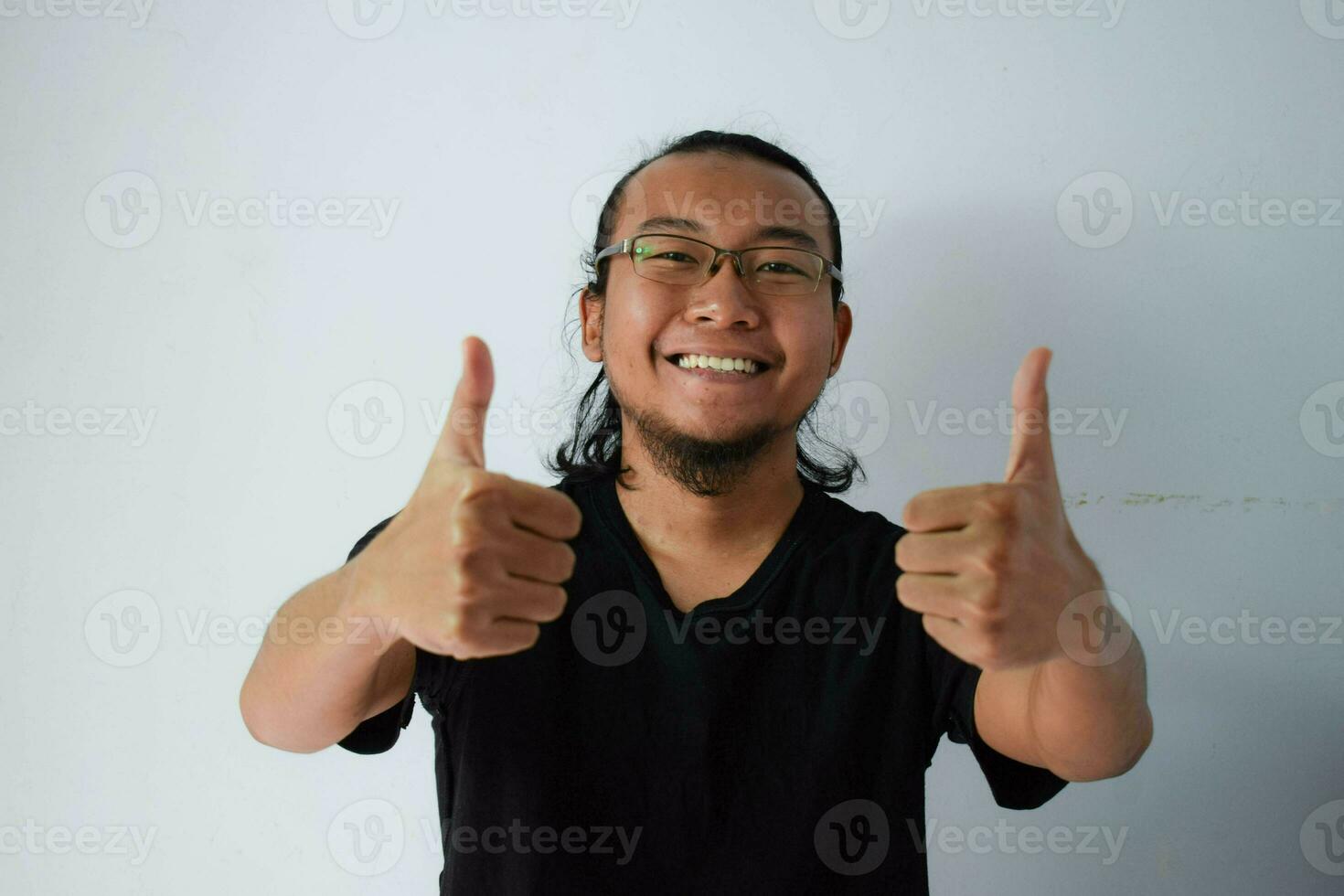 Adult Asian man wearing black t-shirt photo