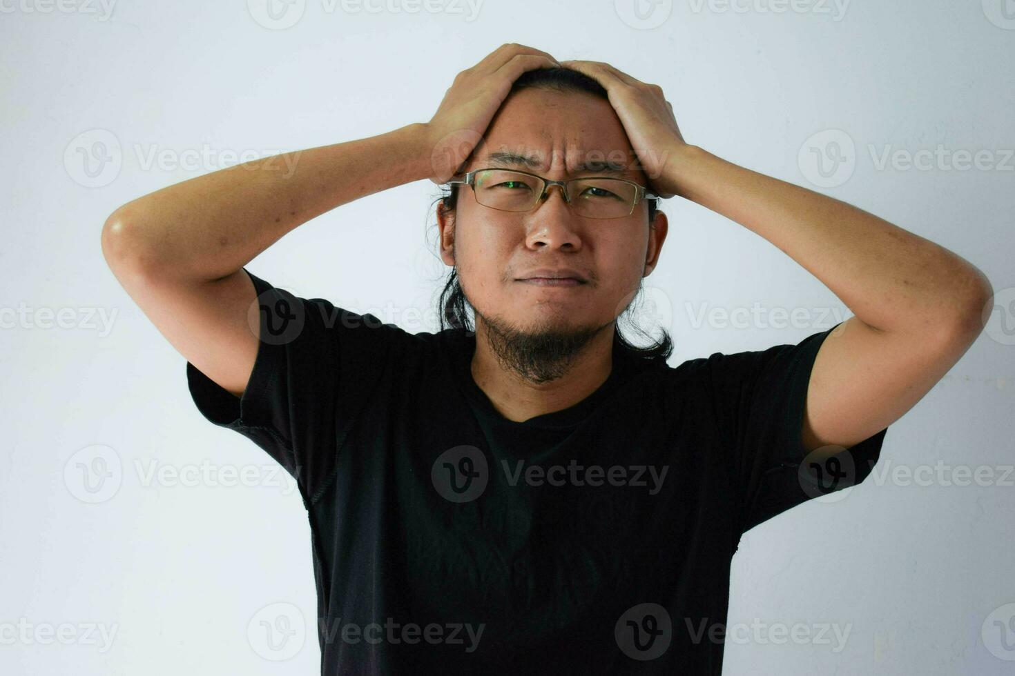 Adult Asian man wearing black t-shirt photo