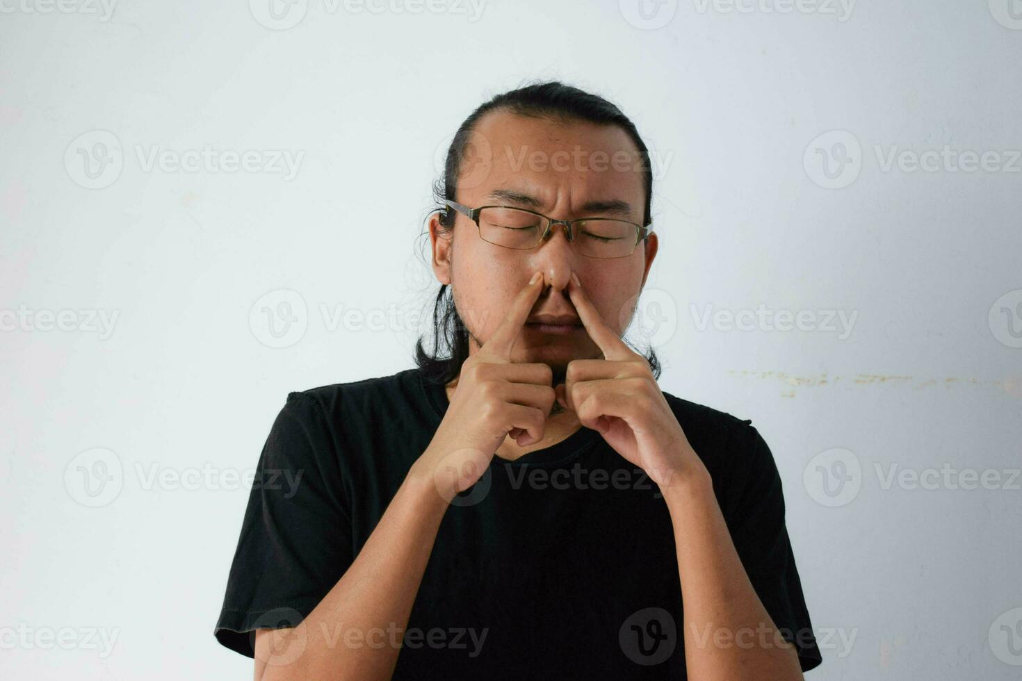 Adult Asian man wearing black t-shirt photo