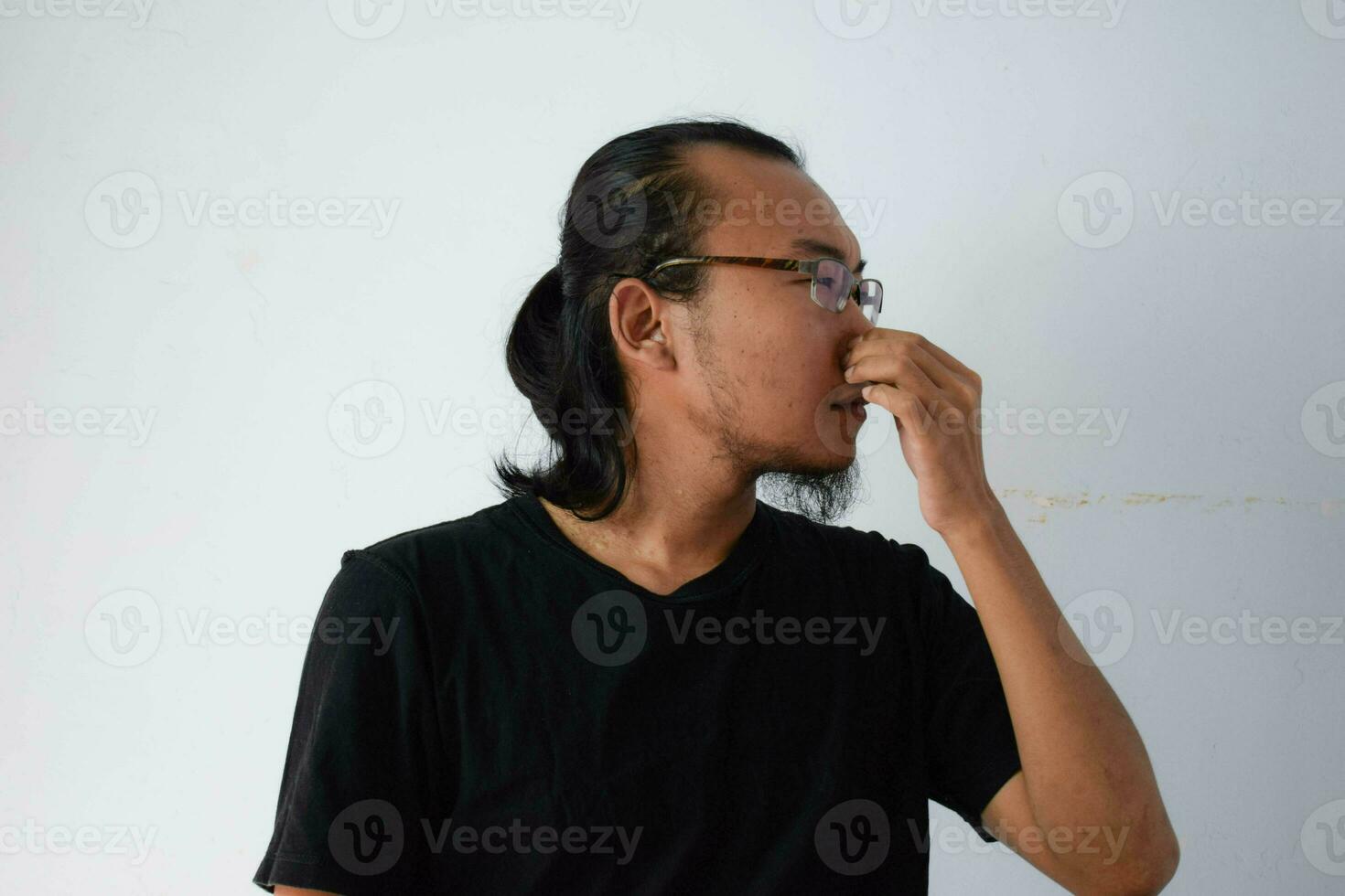 Adult Asian man wearing black t-shirt photo