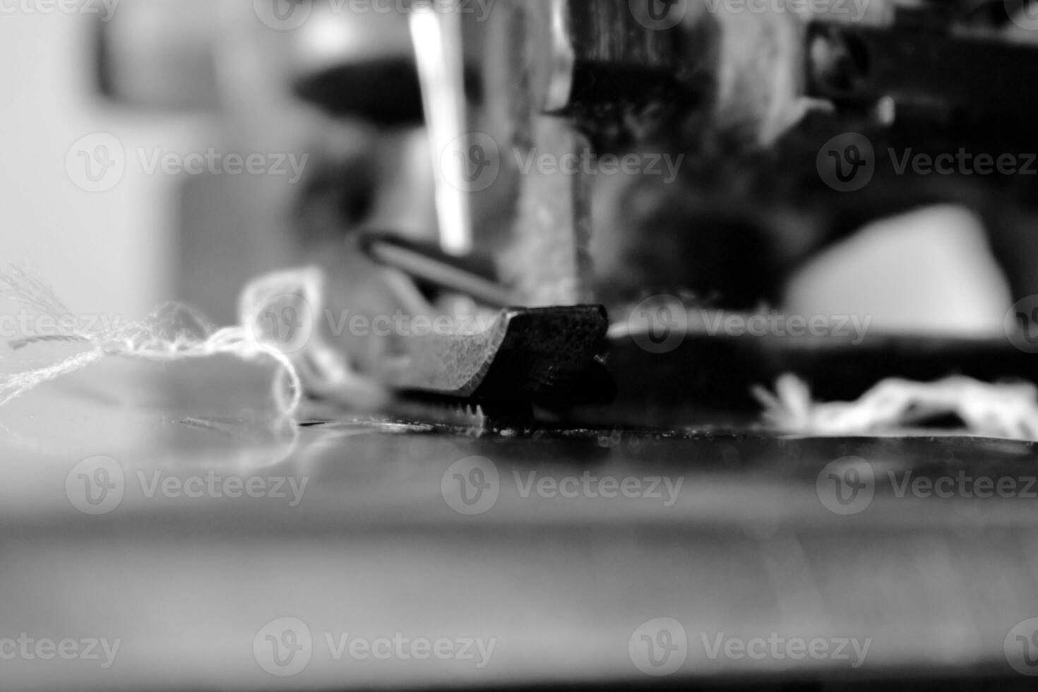 Vintage Black and White Close up Serger or Overlock Machine with threads, vintage black and white concept photo