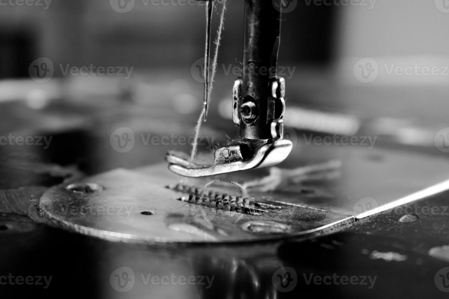 Vintage Black and White Close up Sewing machine and thread, vintage black and white concept photo