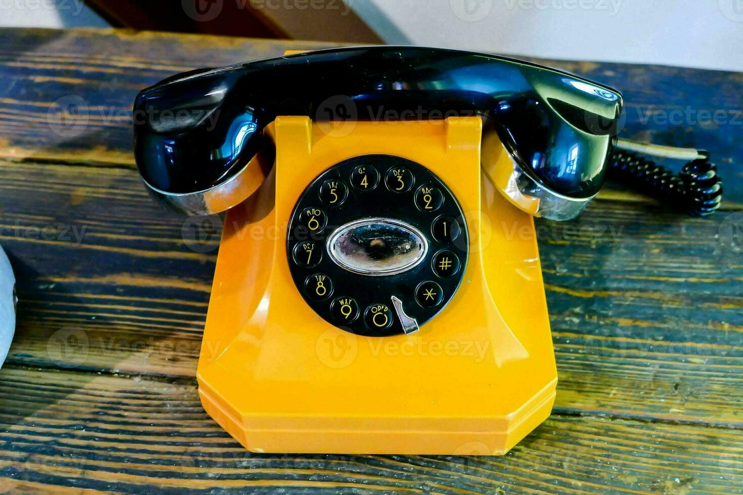 Yellow rotary phone photo