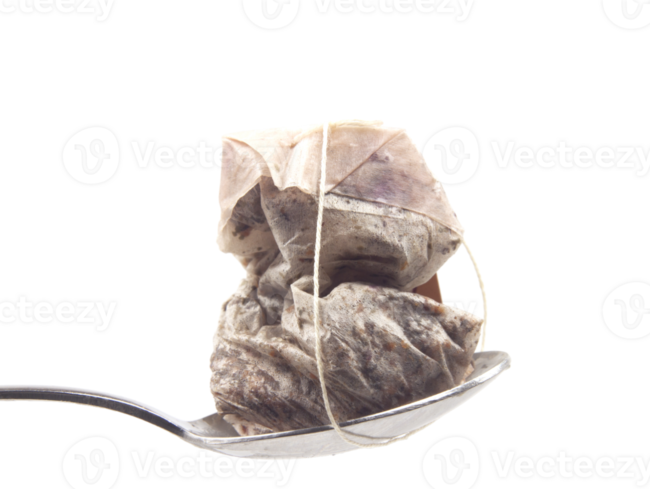 used tea bag on spoon png