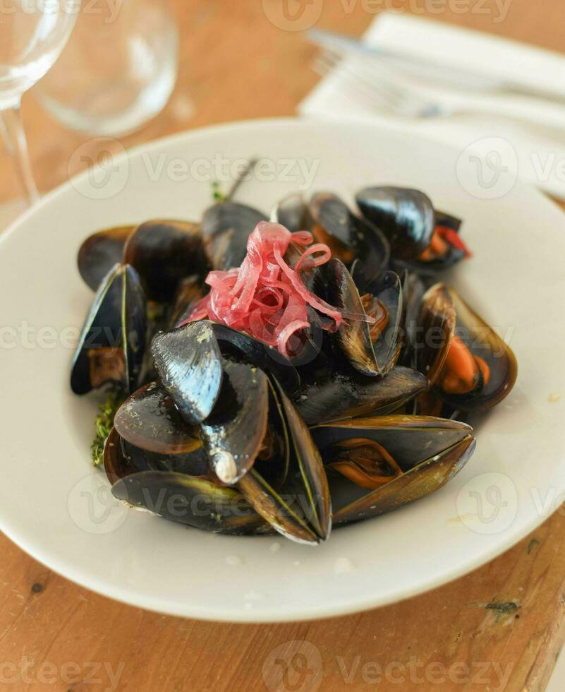Gourmet portion of Galician mussels in a seafood restaurant photo