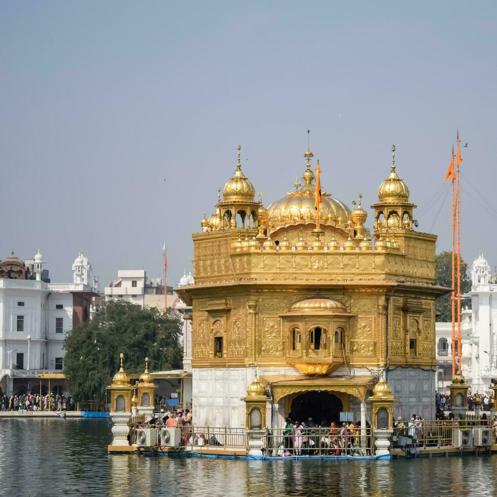 Amritsar, India, July 09 2023 - Beautiful view of Golden Temple - Harmandir Sahib in Amritsar, Punjab, India, Famous indian sikh landmark, Golden Temple, the main sanctuary of Sikhs in Amritsar, India photo
