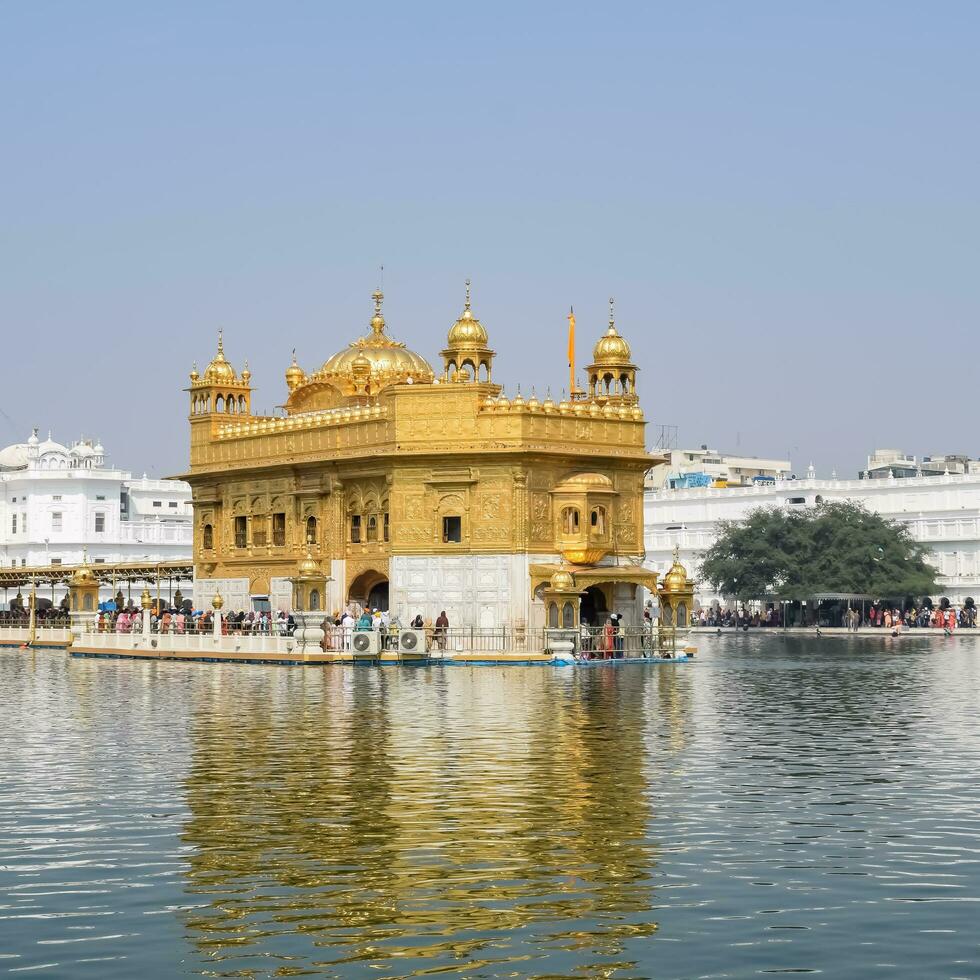 Amritsar, India, July 09 2023 - Beautiful view of Golden Temple - Harmandir Sahib in Amritsar, Punjab, India, Famous indian sikh landmark, Golden Temple, the main sanctuary of Sikhs in Amritsar, India photo