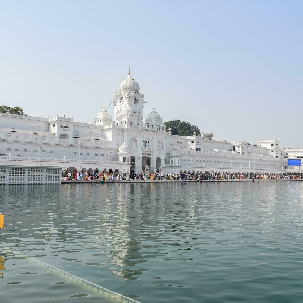 Amritsar, India, July 09 2023 - View of details of architecture inside Golden Temple Harmandir Sahib in Amritsar, Punjab, India, Famous indian sikh landmark, Golden Temple, the main temple photo
