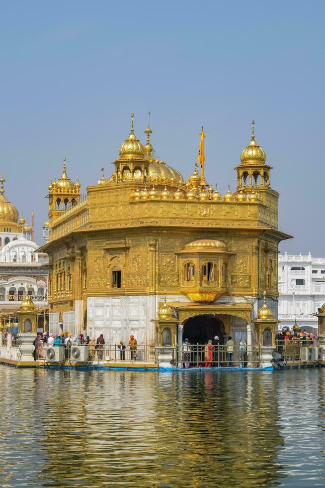 Amritsar, India, July 09 2023 - Beautiful view of Golden Temple - Harmandir Sahib in Amritsar, Punjab, India, Famous indian sikh landmark, Golden Temple, the main sanctuary of Sikhs in Amritsar, India photo