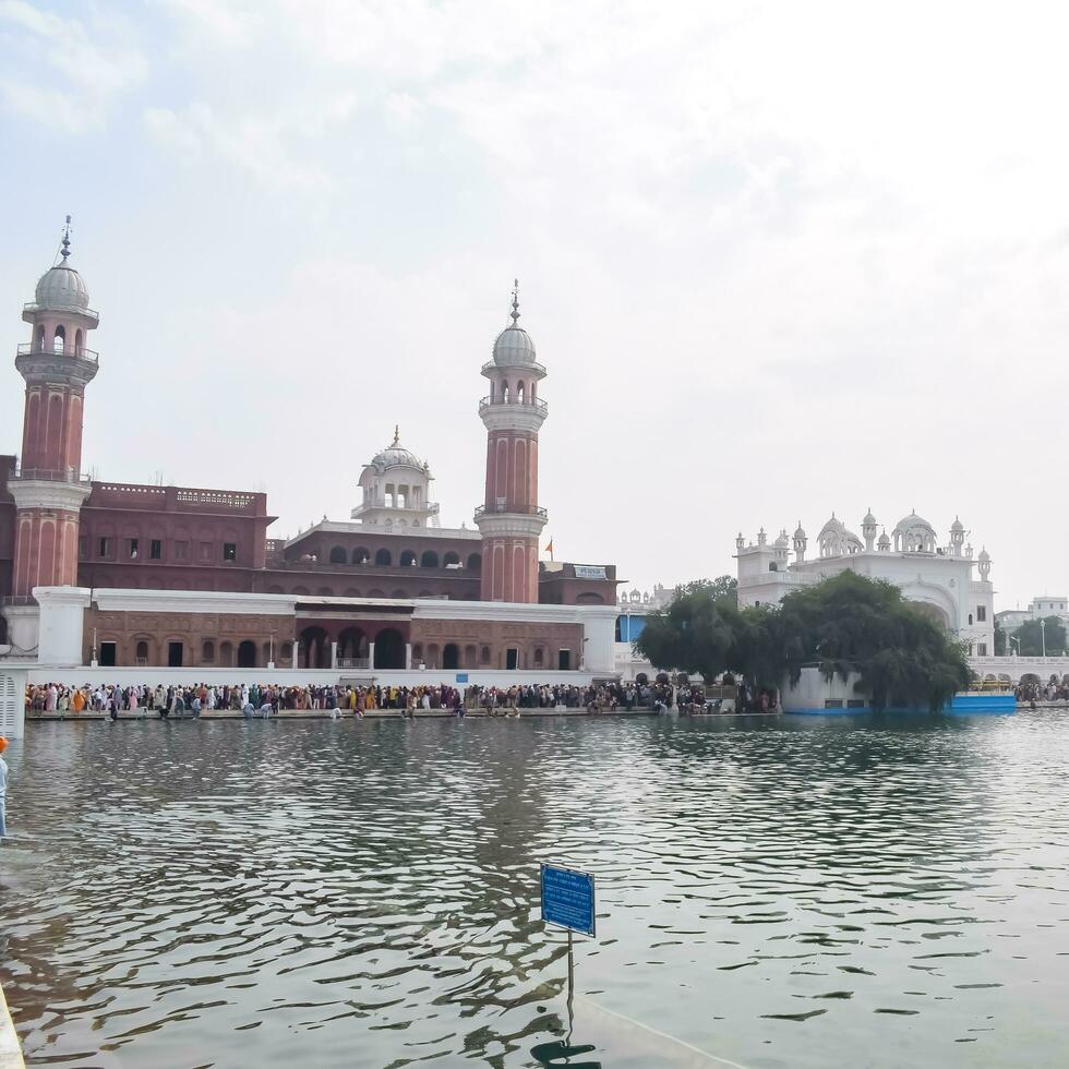 Amritsar, India, July 09 2023 - View of details of architecture inside Golden Temple Harmandir Sahib in Amritsar, Punjab, India, Famous indian sikh landmark, Golden Temple, the main temple photo