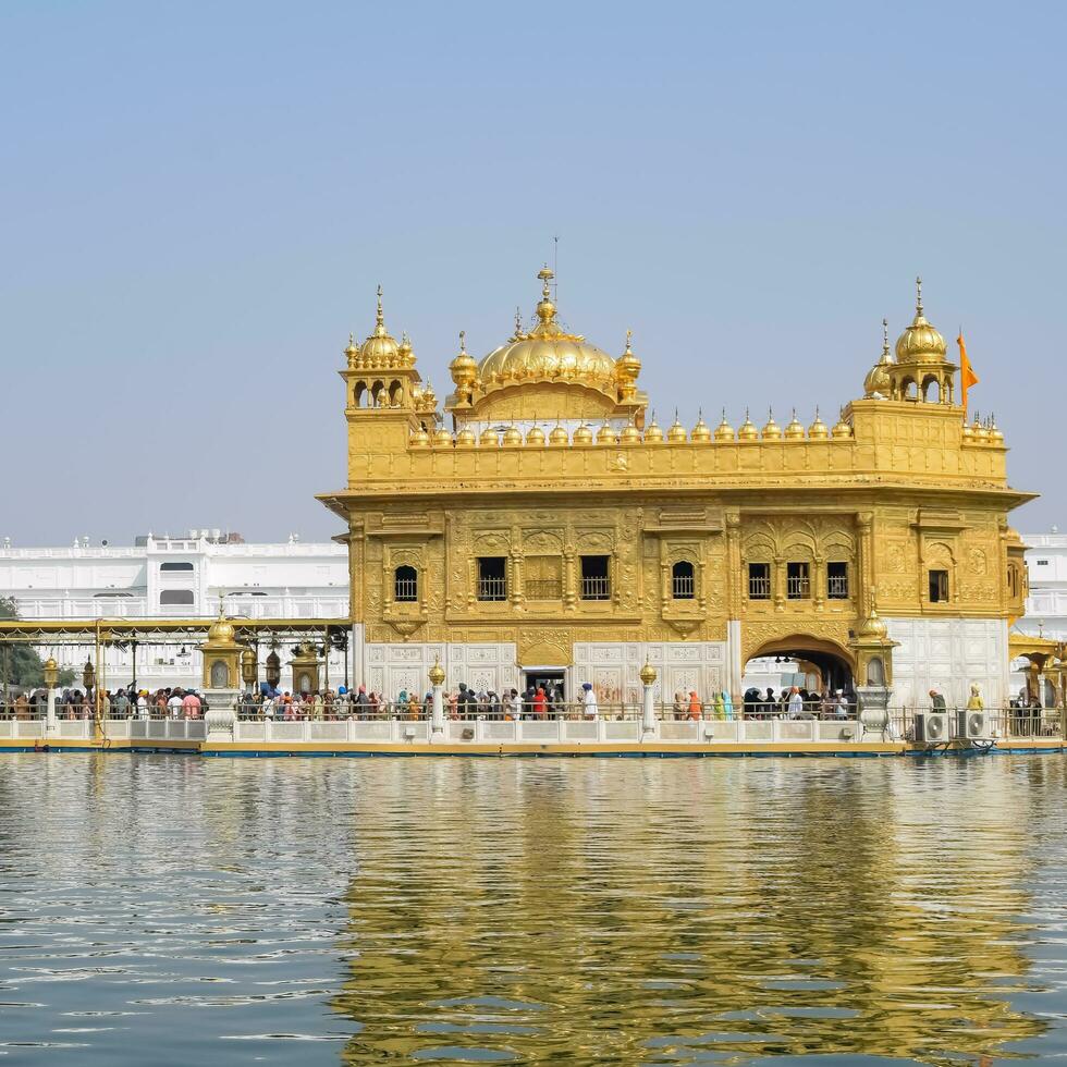Amritsar, India, July 09 2023 - Beautiful view of Golden Temple - Harmandir Sahib in Amritsar, Punjab, India, Famous indian sikh landmark, Golden Temple, the main sanctuary of Sikhs in Amritsar, India photo