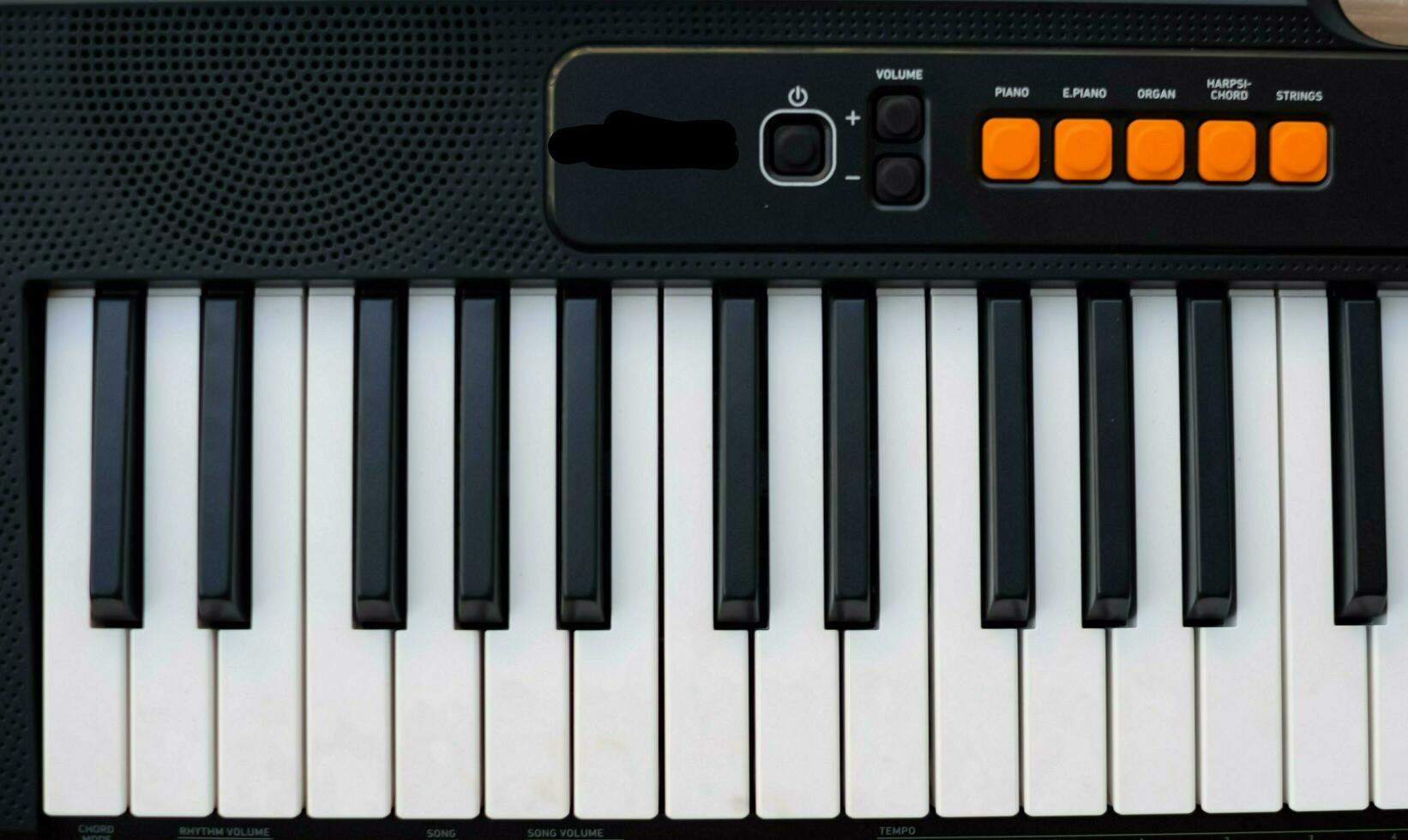 Close-up of piano keys. Piano black and white keys and Piano keyboard musical instrument placed at the home balcony during sunny day. photo