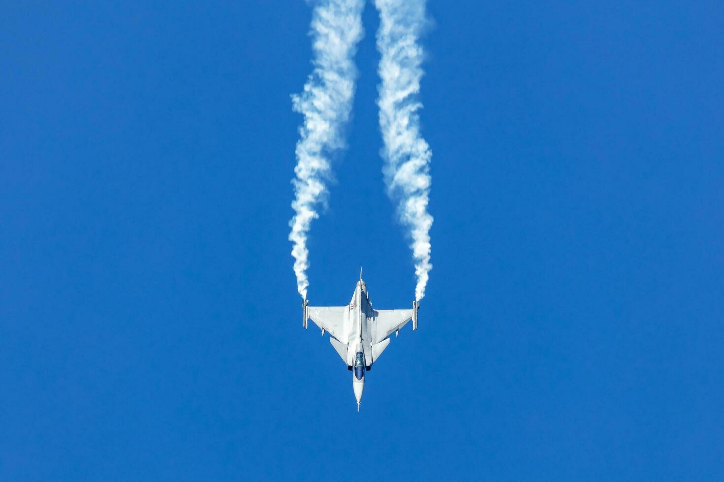 Hungarian Air Force SAAB JAS 39 Gripen fighter jet plane flying. Aviation and military aircraft. photo