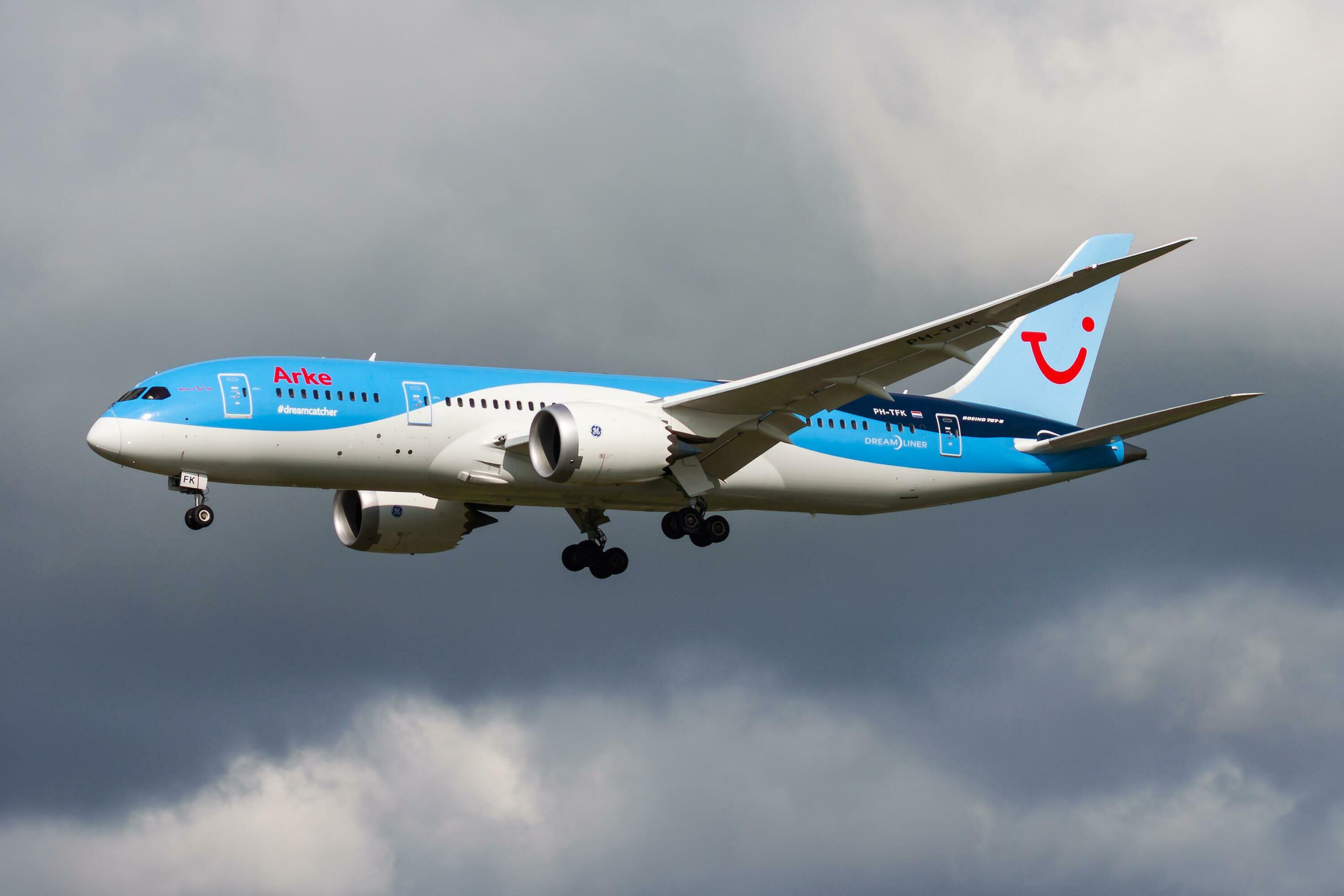 TUI Arkefly passenger plane at airport. Schedule flight travel