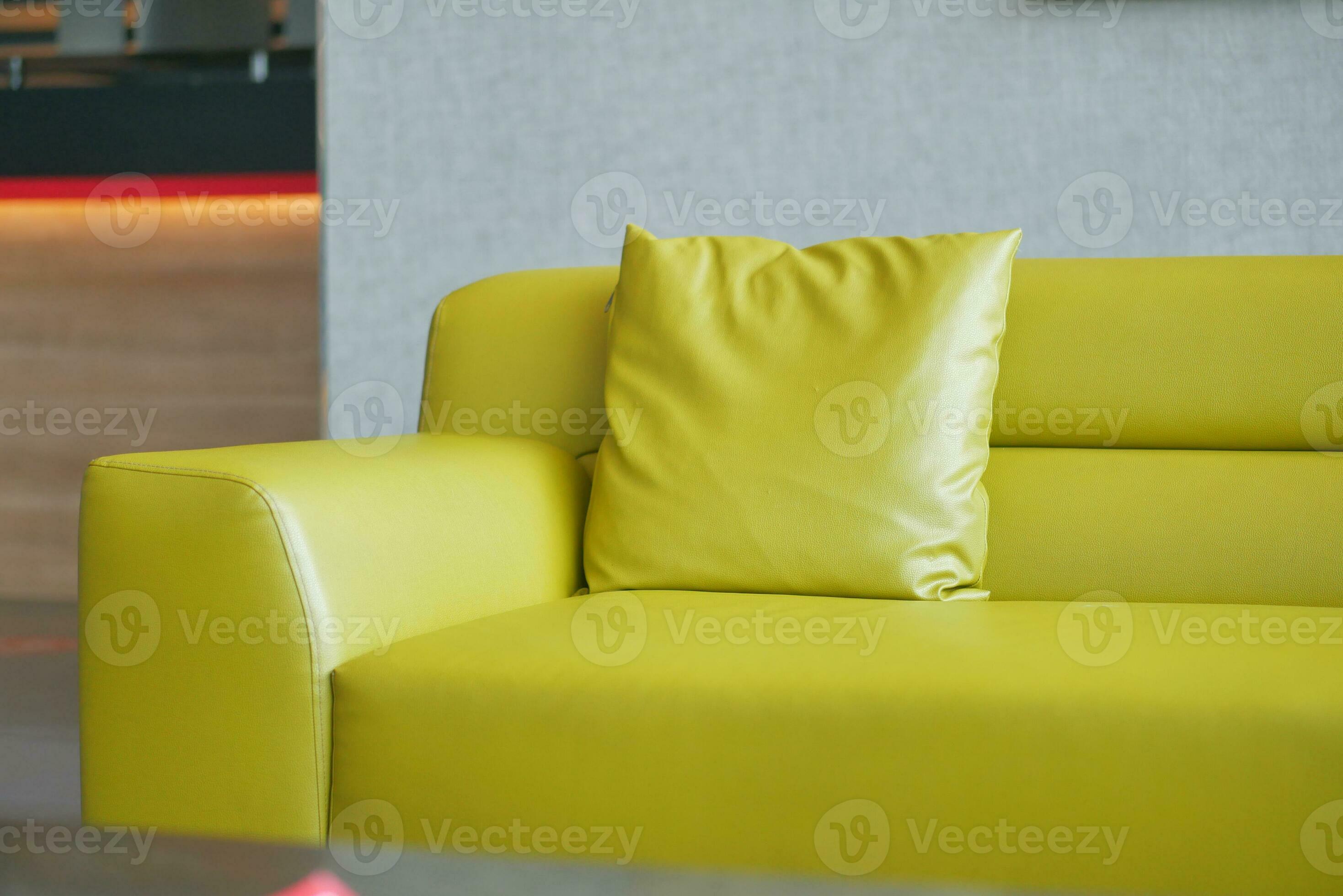 modern yellow sofa with pillows in a wailing room 33889696 Stock Photo