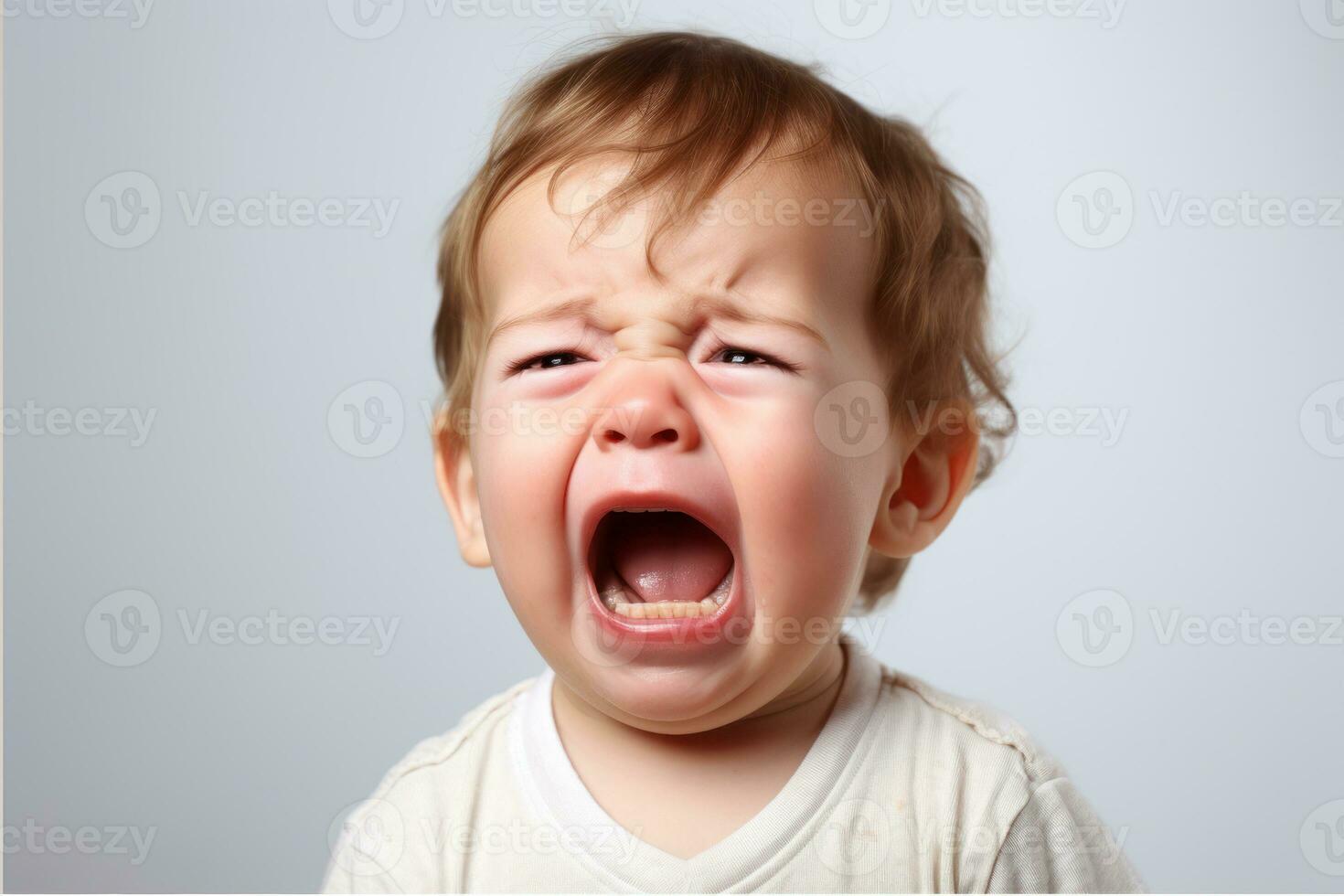 Close up portrait of a cute little boy kid crying and screaming. Isolated on a white background. A white Caucasian child with light hair. Strong emotions of despair, pain, and resentment AI generated photo