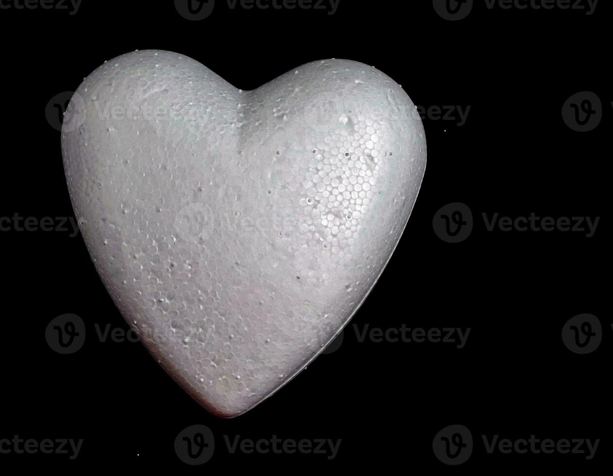 Heart on dark background photo