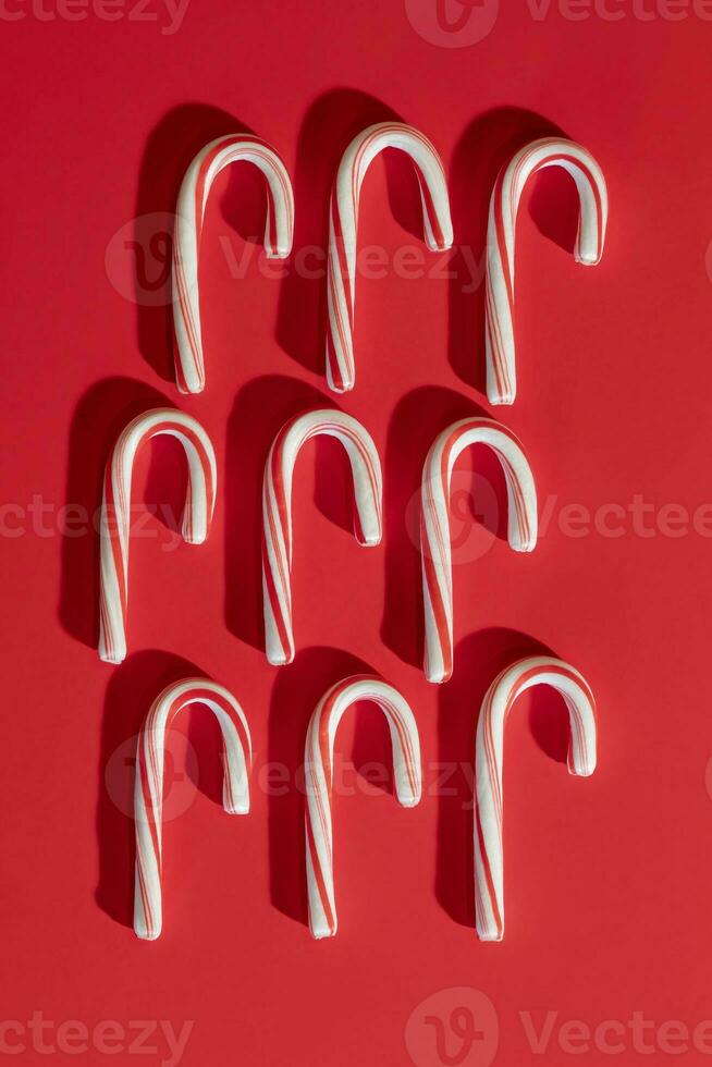 Candy Canes on a Bright Red Background photo