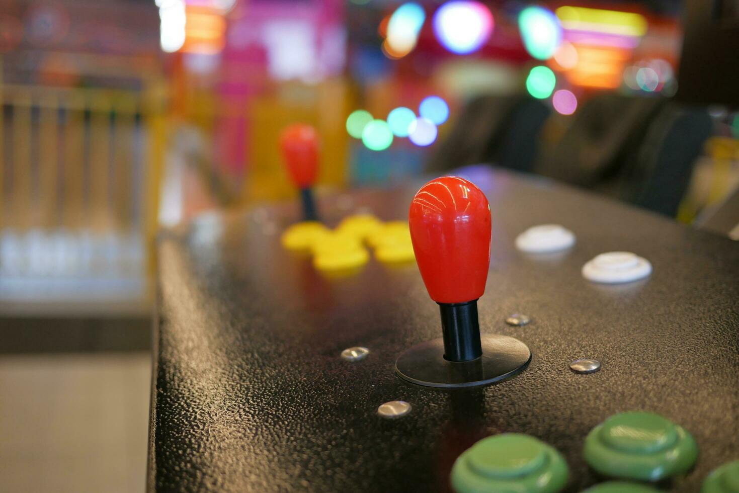 closeup of button on games machine. photo