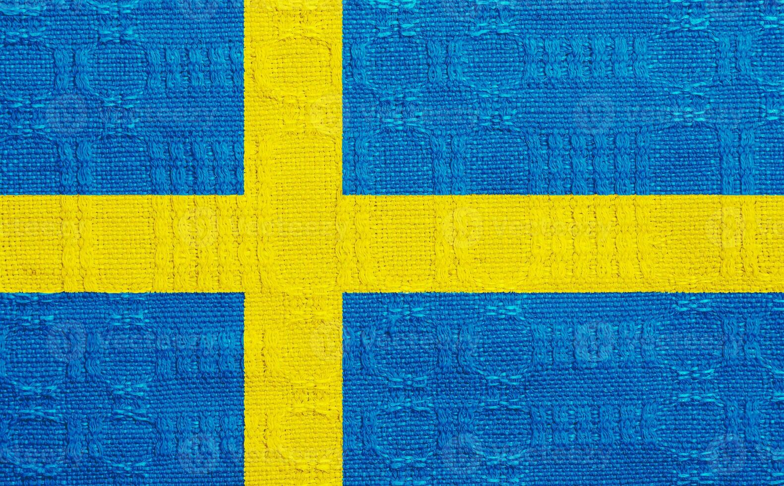 Flag of Kingdom of Sweden on a textured background. Concept collage. photo