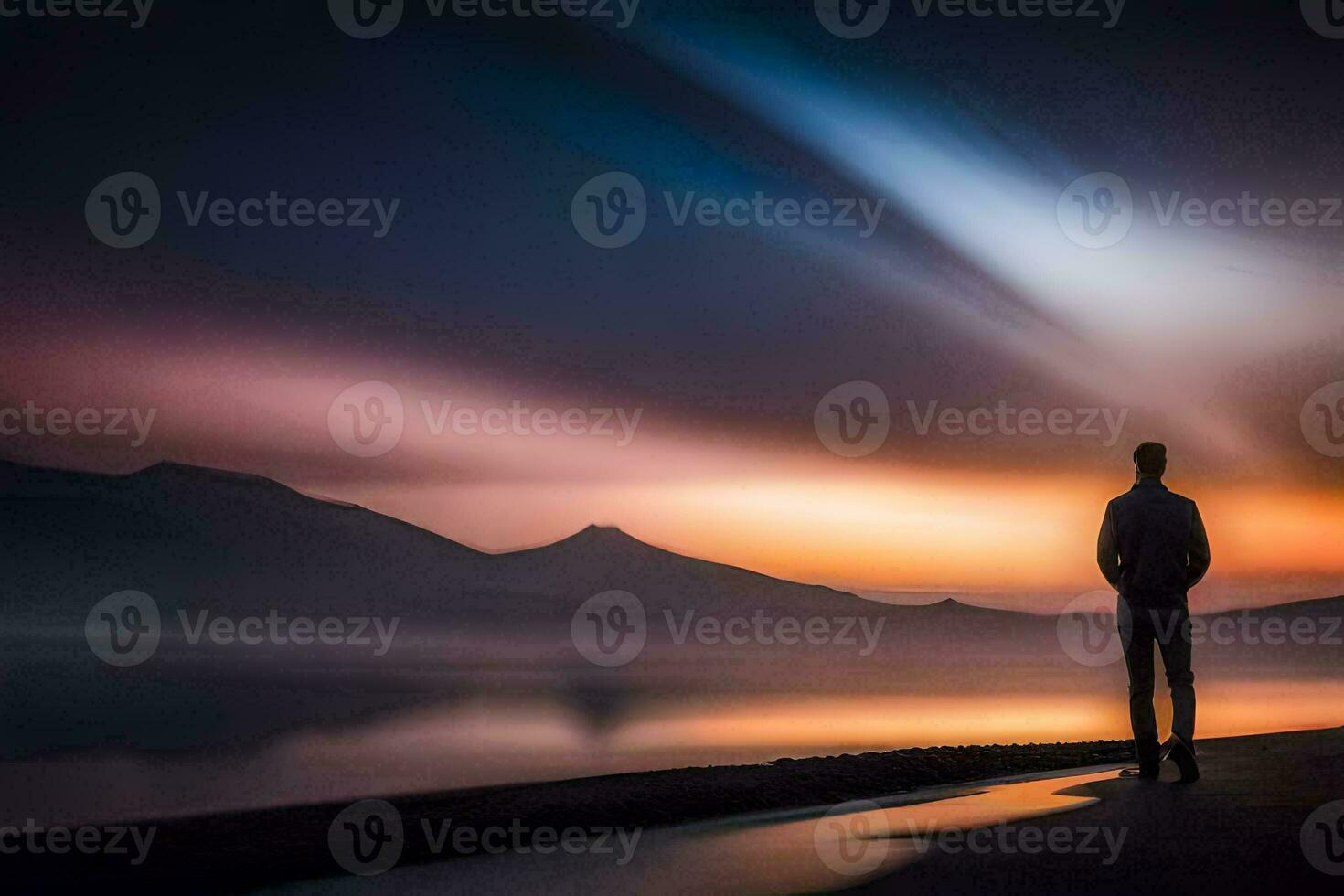 a man standing on the shore of a lake at sunset. AI-Generated photo