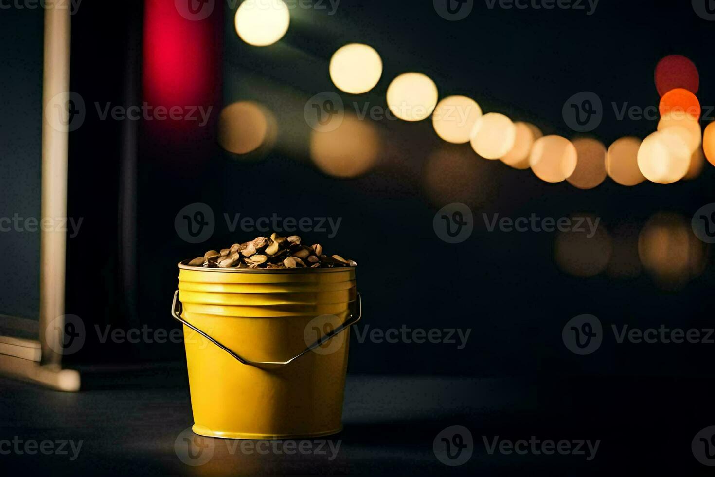 a yellow bucket with a lit up city in the background. AI-Generated photo