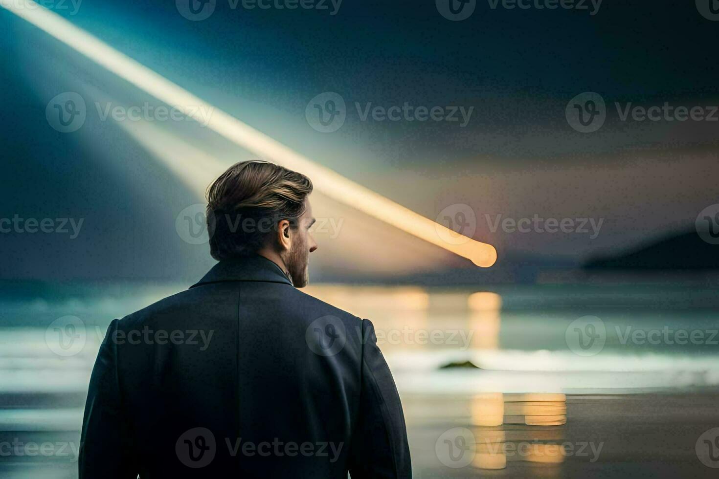 a man in a suit stands on the beach looking at the ocean. AI-Generated photo