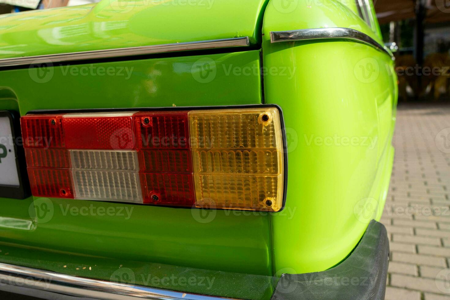 rear light of an old classic car is light green. Details of retro cars photo