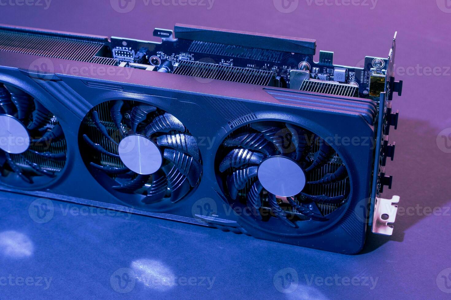 modern powerful gaming graphics card for a computer with three fans photo