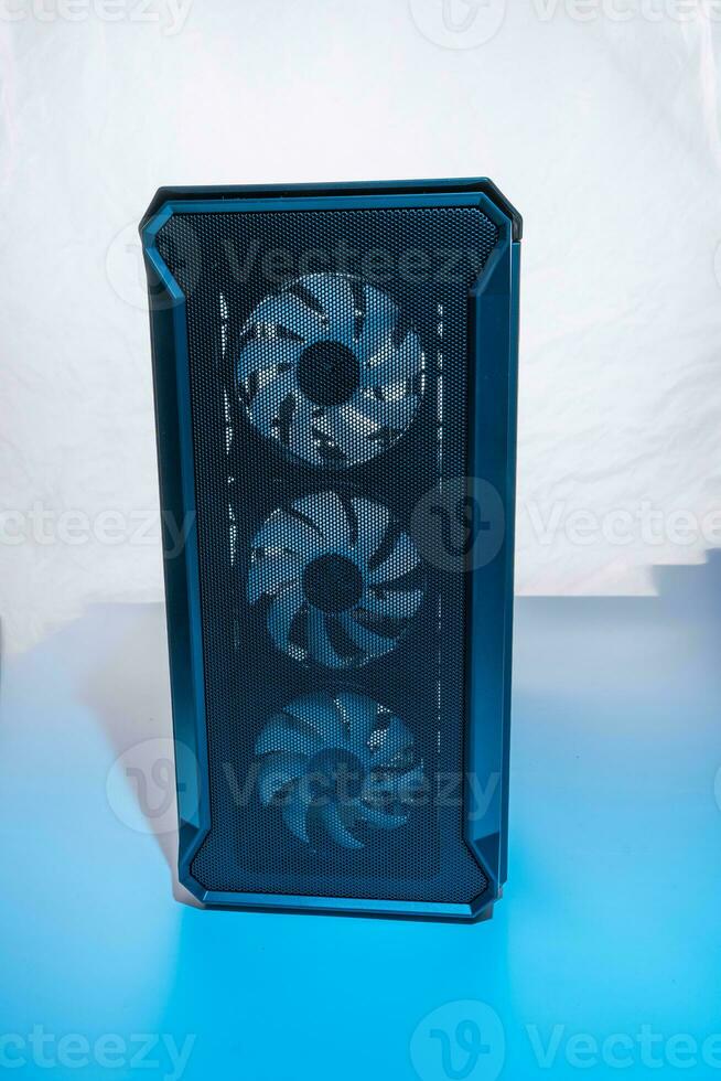 case of the computer system unit with neon illumination. vertical photo
